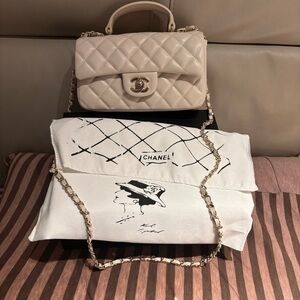 CHANEL Quilted Mini Top Handle Bag in Cream